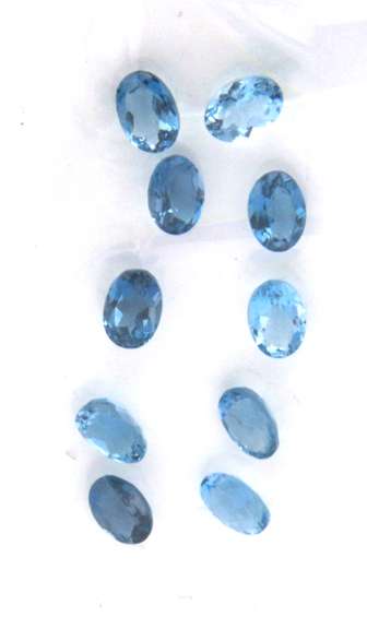 Radiant Group of 10 Oval Cut London Blue Topaz Gemstones, 10.60cts