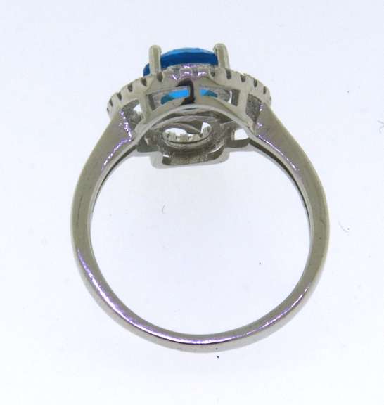 Perfect Sterling Silver Halo Ring with Aqua Blue Gemstone Surrounded by Cubic Zirconias