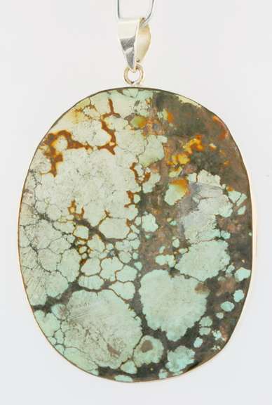Striking well marbled 135.54ct Turquoise cabochon sterling pendant