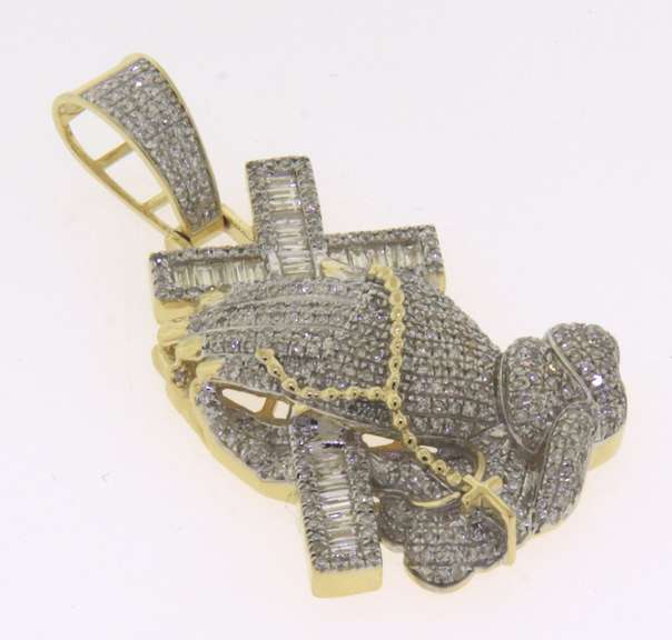 Striking 10kt Diamond Religious Pendant