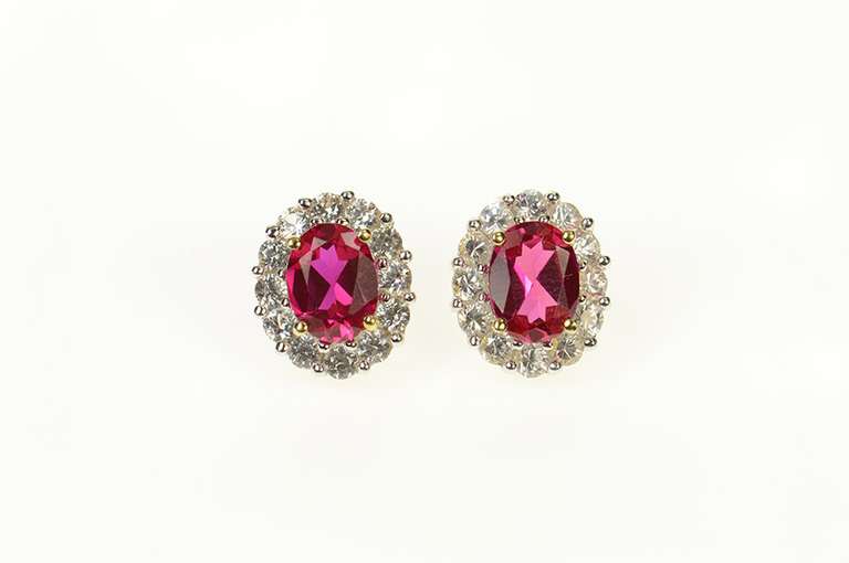 10K Yellow Gold Oval Syn. Ruby CZ Halo Classic Screw Back Earrings