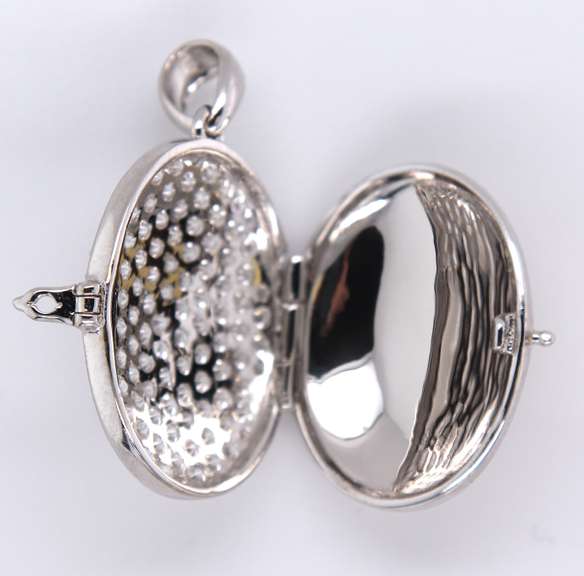 Mesmorizing Oval Locket with Cubic Zirconias