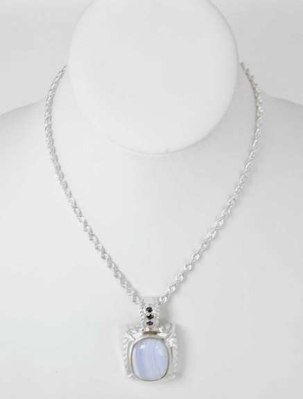 Sterling Silver Purple Gemstone With Sapphires Necklace.