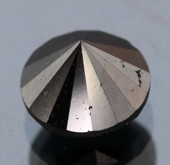 Exquisite 1.75ct smooth cut Black Diamond solitaire