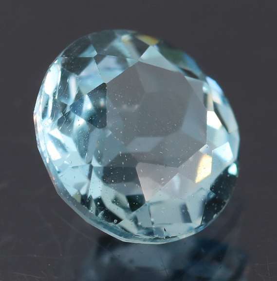 Glittering 3.33ct 9mm sky blue Topaz solitaire