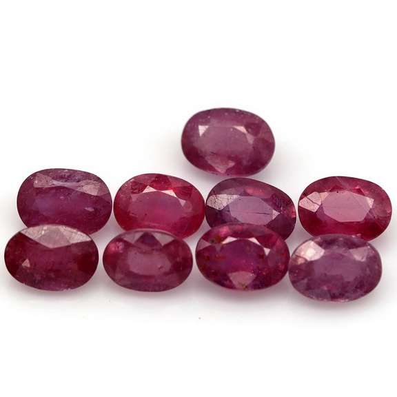 Heavy 10.20ct oval cut Ruby set