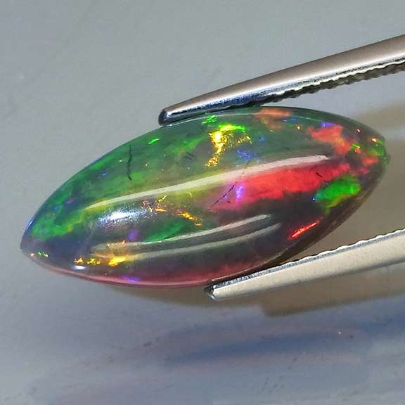 Magnificent 2.78ct full body flashing Black Opal