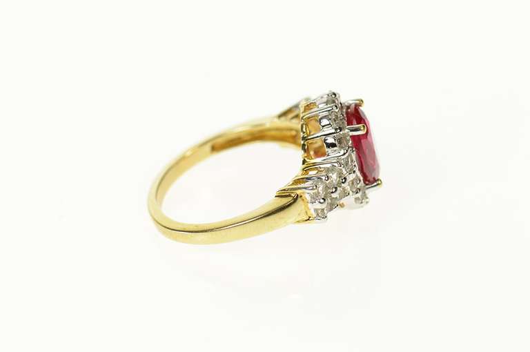 10K Yellow Gold Oval Syn. Ruby CZ Halo Classic Statement Ring
