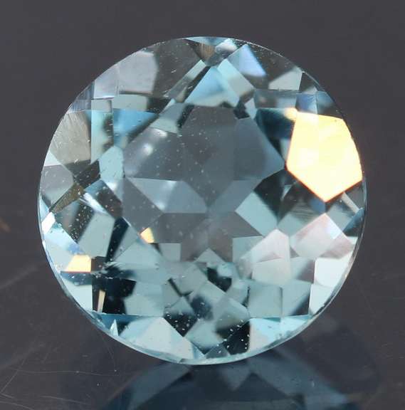 Glittering 3.33ct 9mm sky blue Topaz solitaire