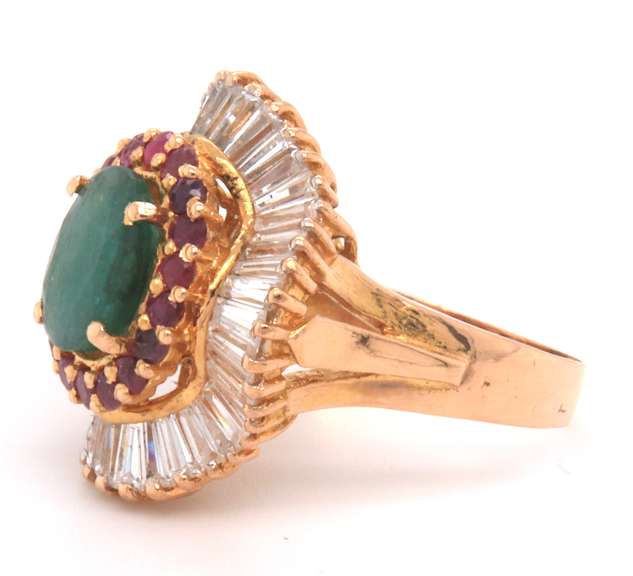 18k yellow gold ladies emerald rubies and diamond ballerina ring.