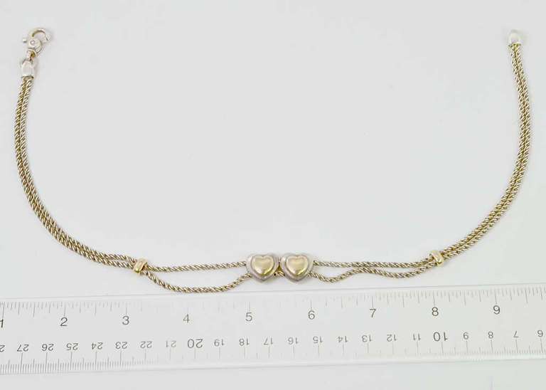 Sterling Silver Heart Necklace With Gold Plated Hearts.