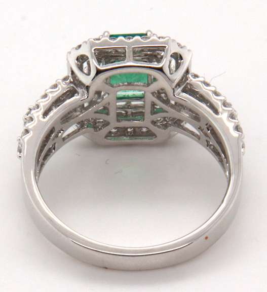 Beautifully Intricate Emeral Ring Engulfed in Diamonds with an 18k Stamped White Gold Band