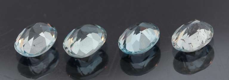 Heavy 6.30ct vivid sky blue Topaz set