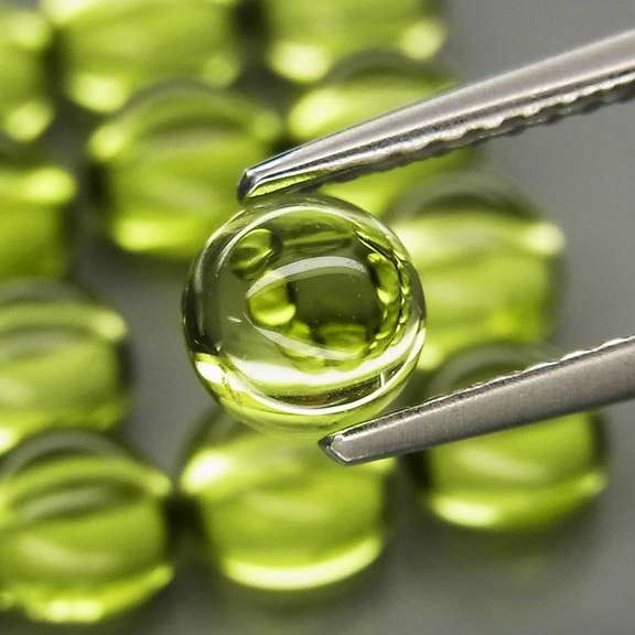 Pristine 10.73ct 16pc lime green Peridot set