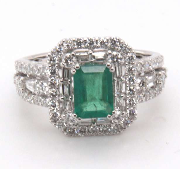Beautifully Intricate Emeral Ring Engulfed in Diamonds with an 18k Stamped White Gold Band