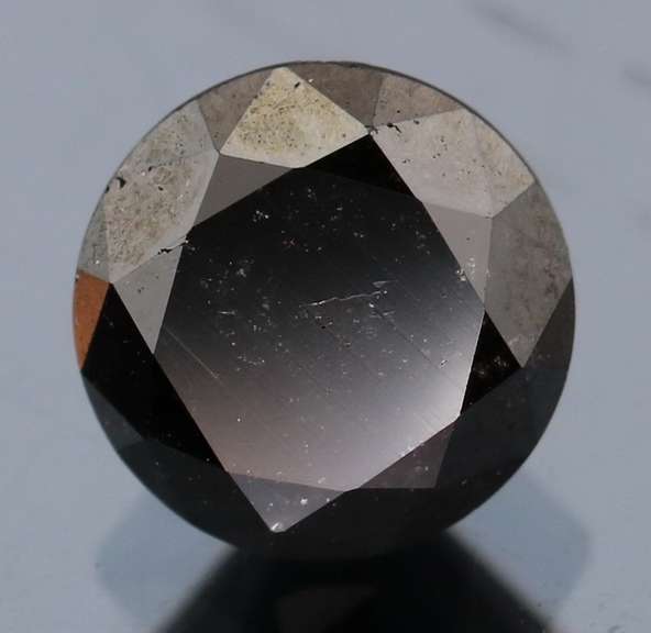 Exquisite 1.75ct smooth cut Black Diamond solitaire