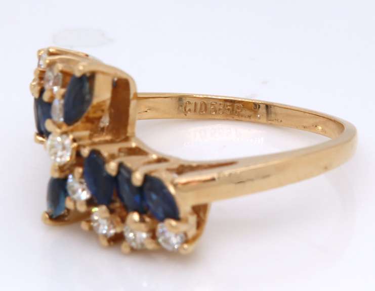 Powerful Marquise Sapphire and Diamond Bypass Ring