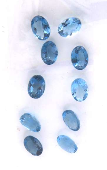 Radiant Group of 10 Oval Cut London Blue Topaz Gemstones, 10.60cts