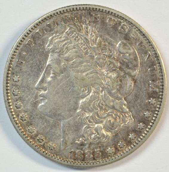 Nice key date 1885-S Morgan Silver Dollar. Original AU