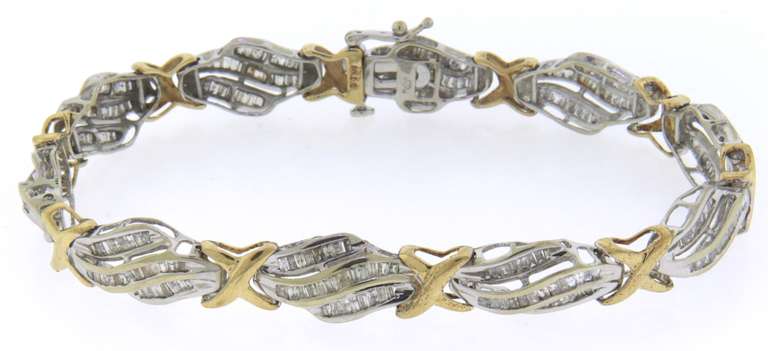 10K GOLD BEAUTIFUL TWO TONE LADIES DIAMOND BRACELET.