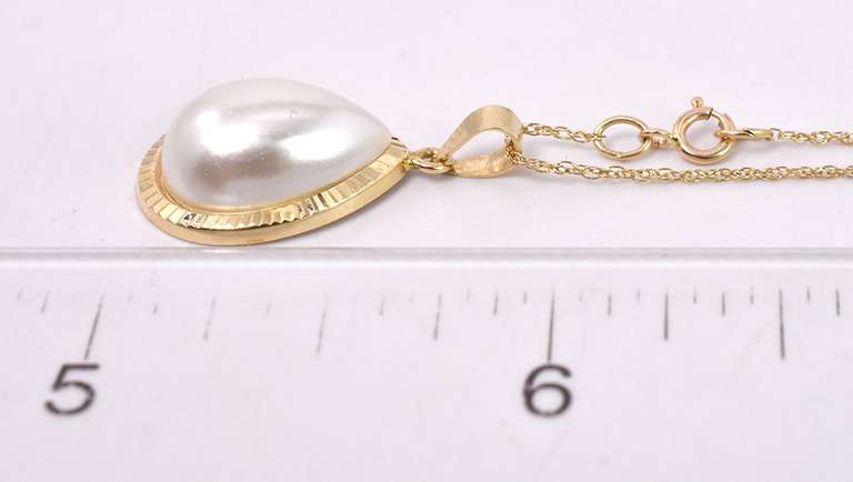 Pretty "Pearl - like" Pendant in 14K Yellow Gold