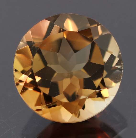Rich red amber 3.13ct Imperial Topaz solitaire