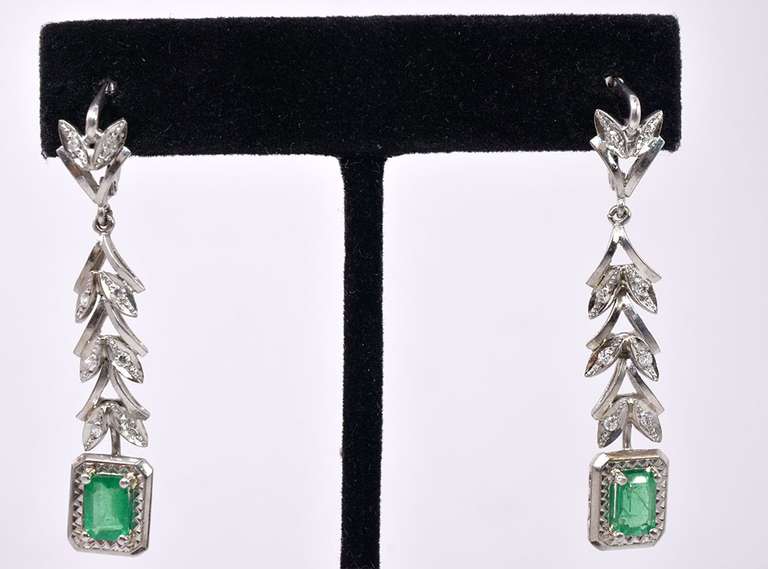 Fancy Ladies Emerald and Diamond Earrings in Platinum
