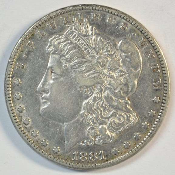 Rare key date 1881-CC Morgan Silver Dollar in XF/AU