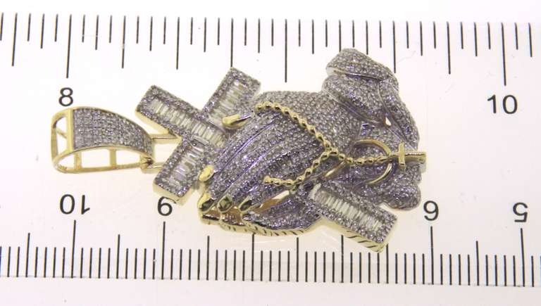 Striking 10kt Diamond Religious Pendant