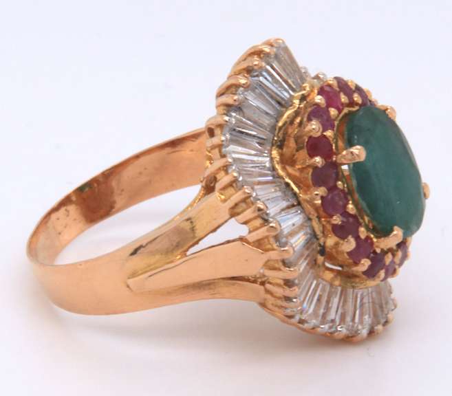 18k yellow gold ladies emerald rubies and diamond ballerina ring.