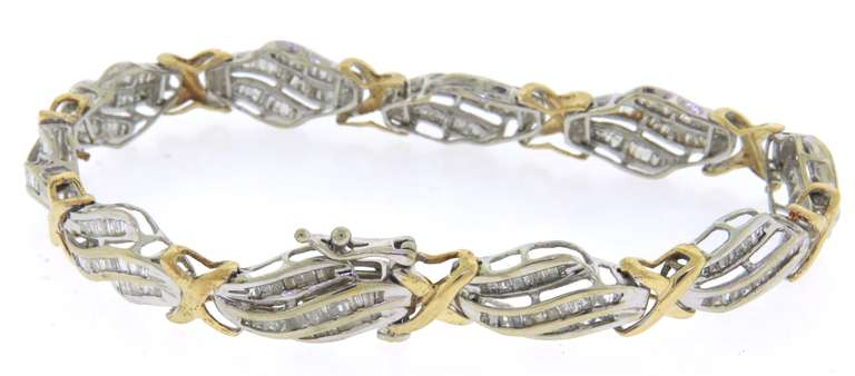 10K GOLD BEAUTIFUL TWO TONE LADIES DIAMOND BRACELET.