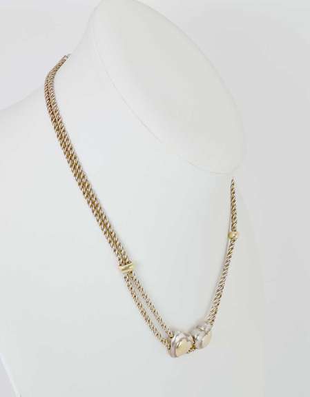 Sterling Silver Heart Necklace With Gold Plated Hearts.