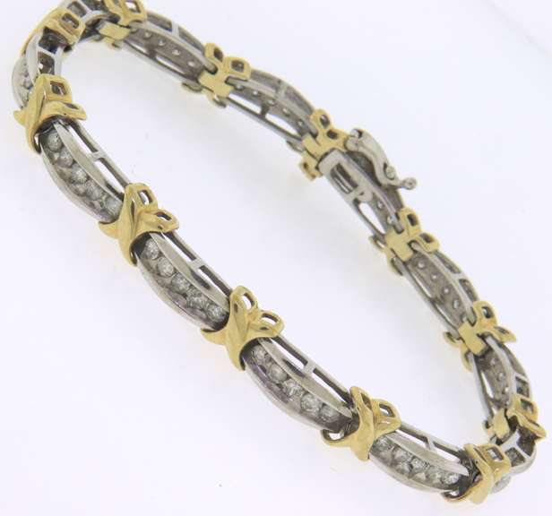 14k white and yellow gold ladies diamond bracelet xo design