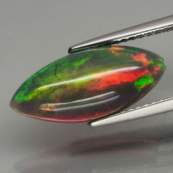 Magnificent 2.78ct full body flashing Black Opal