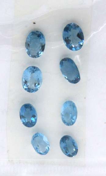 Exceptional Group of 8 Oval Cut London Blue Topaz Gemstones, 10.37cts