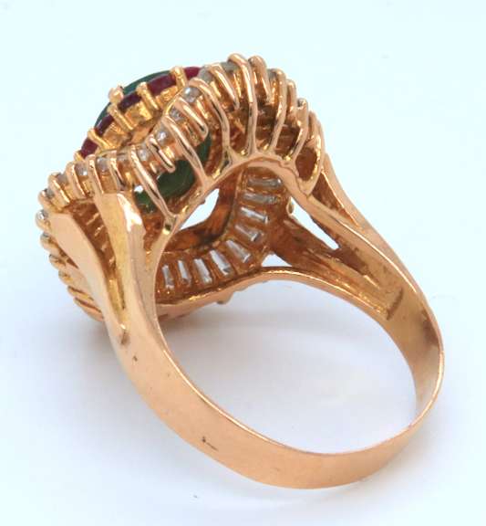 18k yellow gold ladies emerald rubies and diamond ballerina ring.