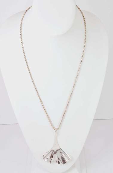 Sterling Silver Tail Shaped Necklace.