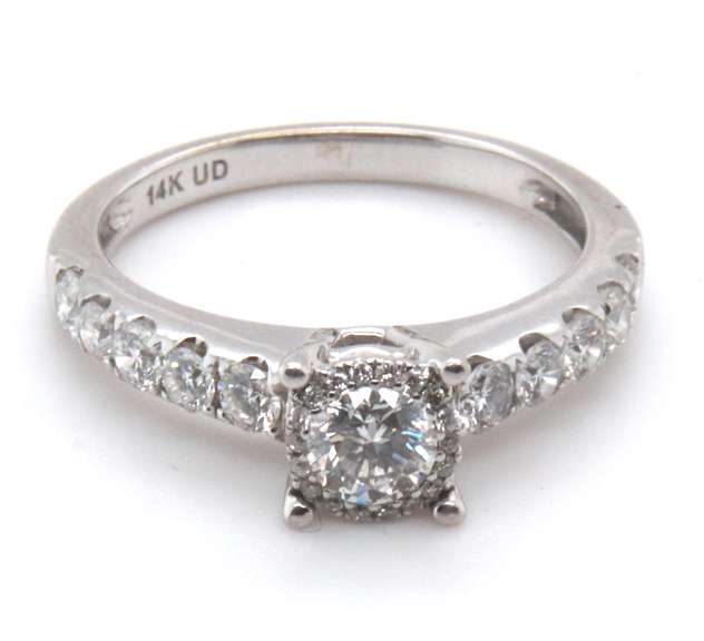 LADIES 14KT WHITE GOLD DIAMOND WEDDING BAND.