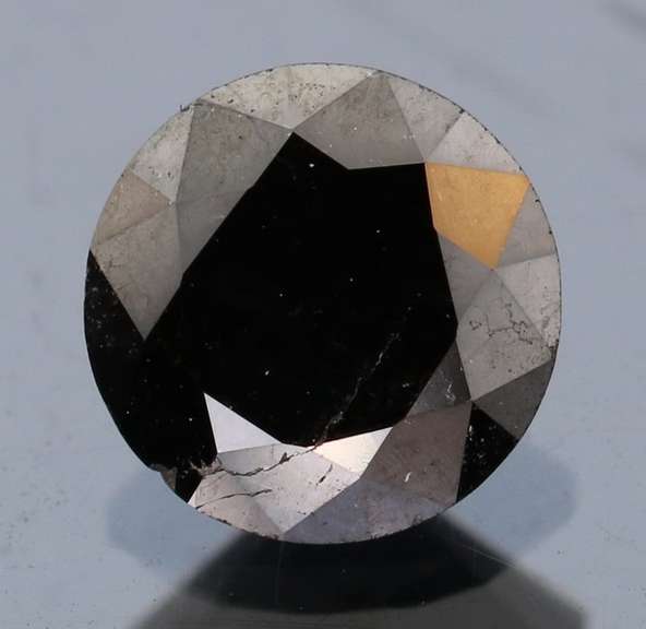 Exquisite 1.18ct smooth cut Black Diamond solitaire