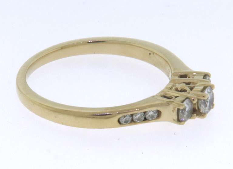 Fancy Yellow Gold 3 Diamond Ring