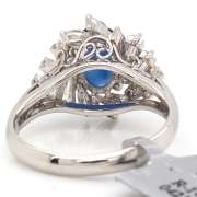Remarkable White Gold Blue Sapphire w Mixed Cuts around Diamond Ring