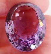 Substantial oval cut 51.91ct violet Amethyst