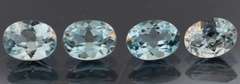 Heavy 6.30ct vivid sky blue Topaz set