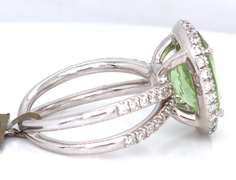Dreamy 18kt Peridot Oval Cut and RBC Diamond Halo Double Shank Ring
