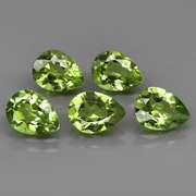 Dazzling 6.17ct untreated apple green Peridot set
