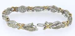 10K GOLD BEAUTIFUL TWO TONE LADIES DIAMOND BRACELET.