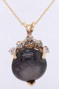 Stunning Cabochon Cut Purple Star Sapphire and Diamond Pendant on Chain