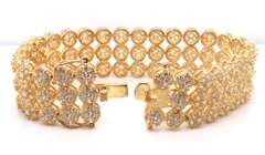 Gold Plated Sterling Silver Tennis Bracelet with Triple Rows of Cubic Zirconias