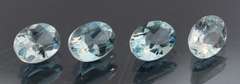 Heavy 6.30ct vivid sky blue Topaz set