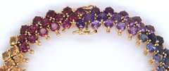 Ladies 14k gold bracelet with multi color gem stones